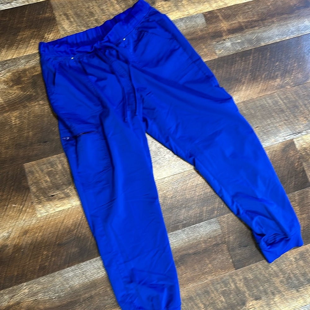Scrub star, galaxy blue joggers.